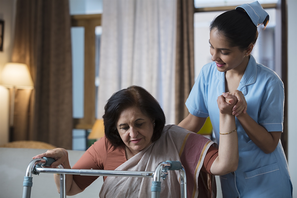 Nurse Taking Care of Elder Women at Atman Care Home